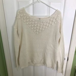 Long sleeve cream color sweater with pompops